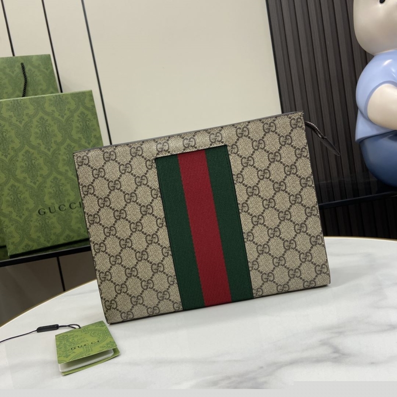 G*u*i clutch bags